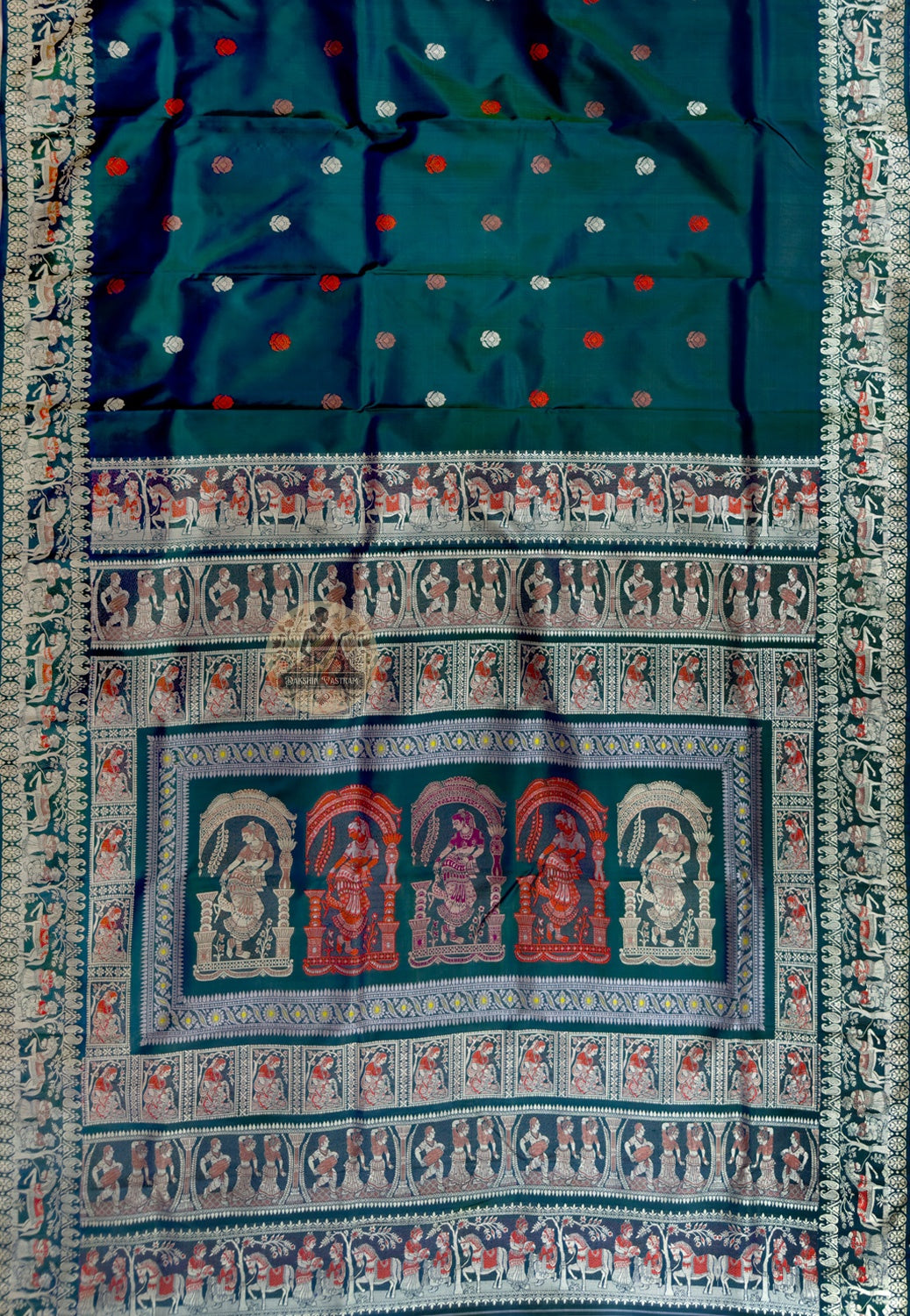 Side view of Baluchari pure silk saree draped in classic style, hand-woven motifs on border and pallu, Bengali festive wear