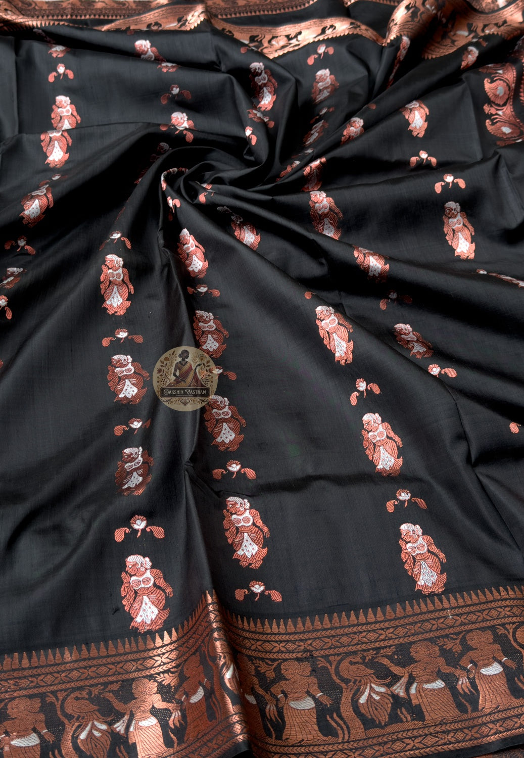 Rear view of Swarnachari silk saree showing ornate zari pallu with temple-art motifs, handwoven in West Bengal