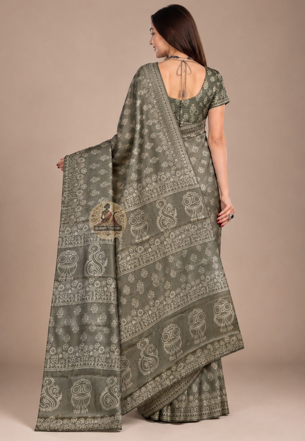  Side view of Bishnupur Katan silk saree showing hand block print border and naturally lustrous pure silk drape, terracotta-inspired motifs pressed into silk by hand, West Bengal craft