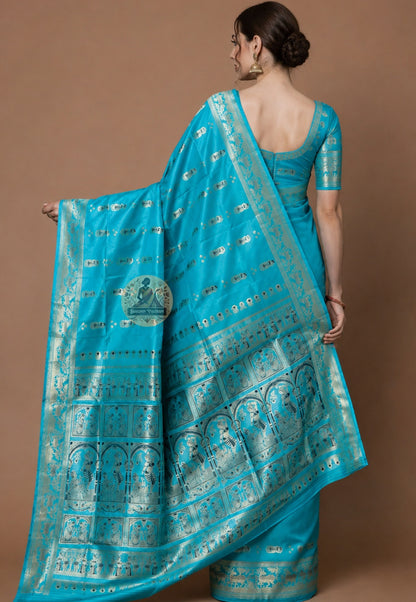 Front view of woman in Swarnachari pure silk saree, traditional Bengali drape with golden zari heritage pallu carrying Bengal's artistic tradition over left shoulder