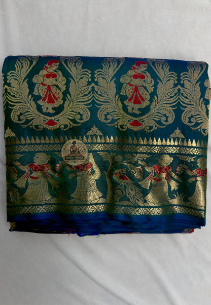 Close-up of handwoven silk weave on Swarnachari saree showing golden zari thread and natural sheen