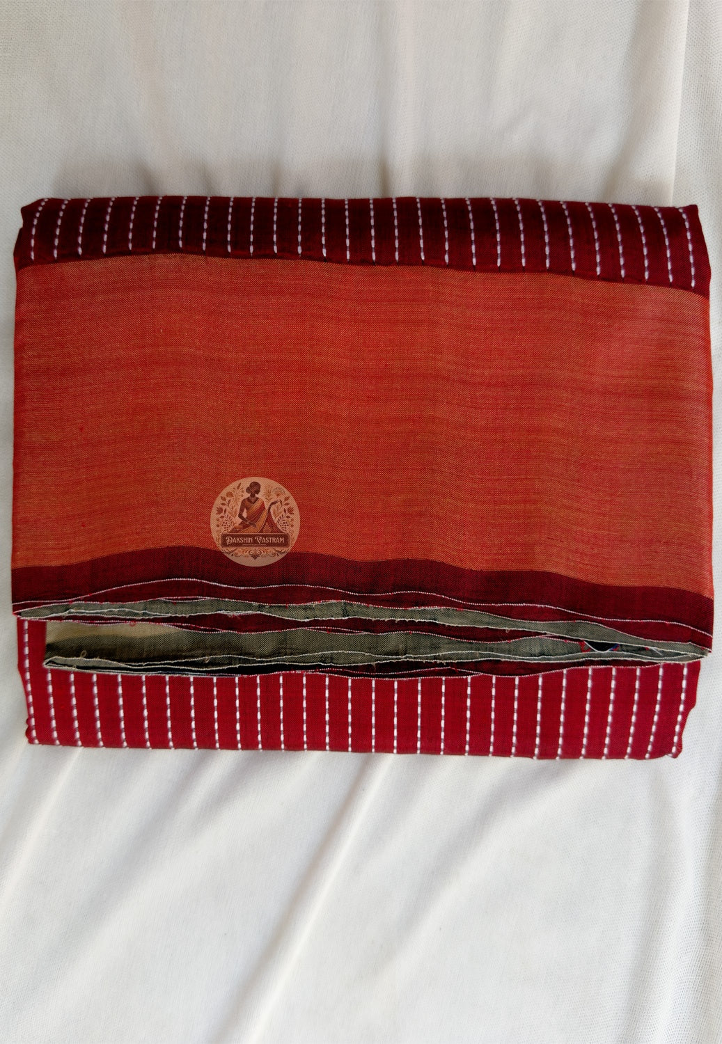 Full flat-lay of handloom Bishnupur Katan silk saree with naturally lustrous quiet statement weave, restrained border, considered buti field, and matching unstitched Katan silk blouse piece, West Bengal handloom