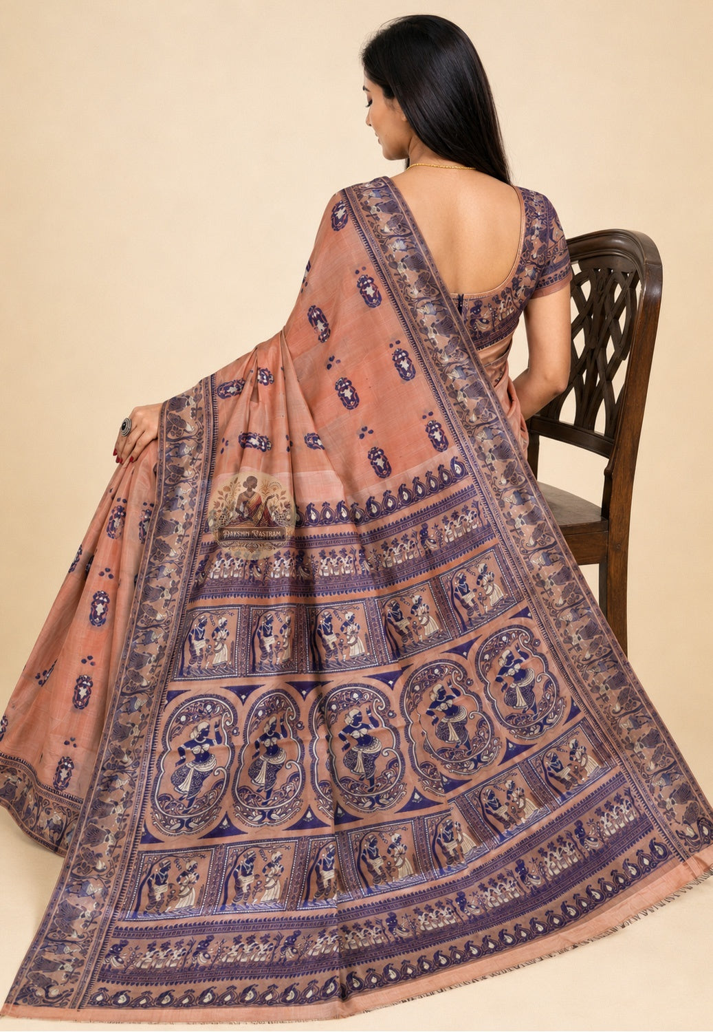 Side view of handwoven Copper Peach Baluchari Silk Saree displaying elegant drape and fine silk texture, perfect for weddings and Durga Puja