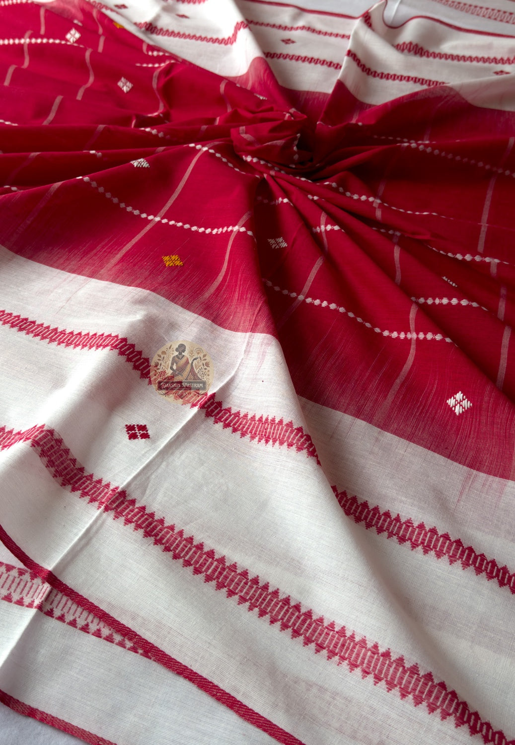 Styling detail of silk blouse paired with handloom pure cotton saree from West Bengal