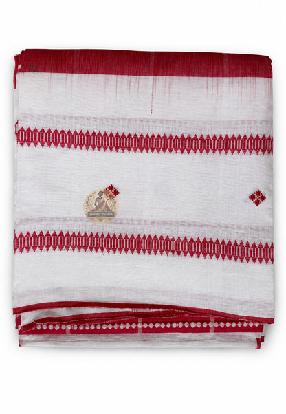 Close-up of woven border on Bengali handloom cotton saree showing artisan weave craftsmanship