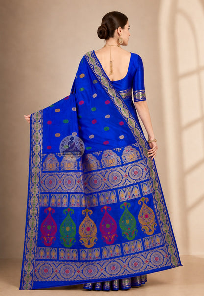 Front view of woman in premium Swarnachari pure silk saree, traditional Bengali drape with golden zari portrait pallu rendering Bengal's craft tradition clearly over left shoulder