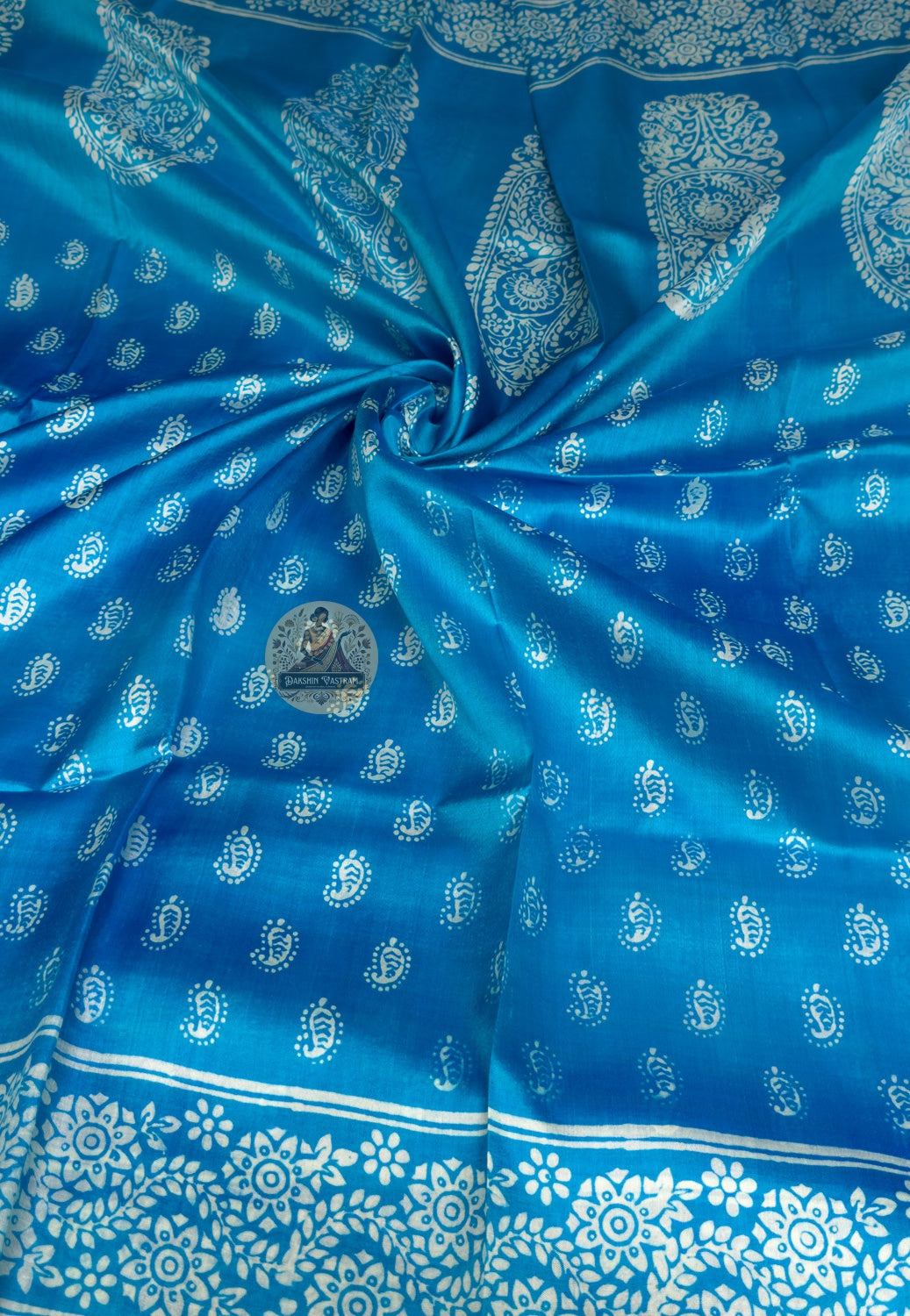 Close-up of sunflower butis woven into pallu of Bishnupur Katan Silk Saree Bengal artisan handloom