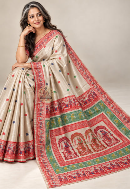 Front view of cream Baluchari silk saree with multicoloured motifs and a red patterned border