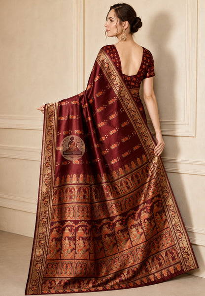 Side view of deep wine Swarnachari Pure Katan Silk Saree showing Navratri Navami drape and golden zari Shakuntala deer border Bishnupur