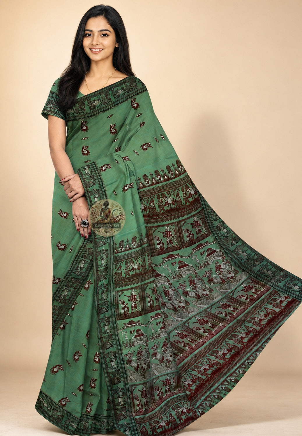 Front view of handwoven Baluchari Silk Saree from Bishnupur Bengal, displaying woven mythological motifs on the pallu and pure silk drape in full glory