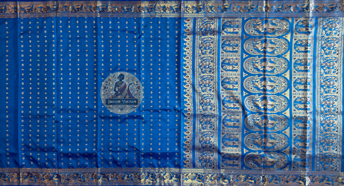 Full saree view of blue Swarnachari pure silk golden zari handloom saree with matching blue blouse piece for Indian weddings Durga Puja Diwali Navratri and diaspora gifting
