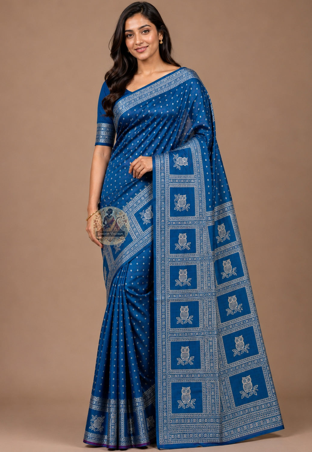 Front view of woman wearing Bishnupur Katan Silk Saree with gold jhumkas, Durga Puja festive occasion