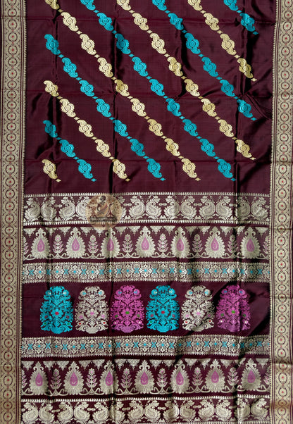 Full saree view of wine Baluchari silk with small floral motifs, pale borders and a multicoloured pallu