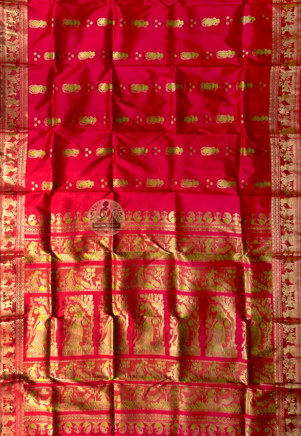Side view of Swarnachari handloom silk saree showing golden zari recovery border and warm pure silk drape of a tradition the loom refused to let go, West Bengal weave
