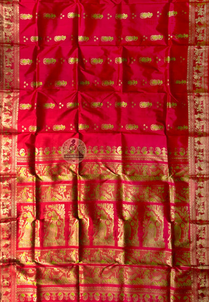 Side view of Swarnachari handloom silk saree showing golden zari recovery border and warm pure silk drape of a tradition the loom refused to let go, West Bengal weave