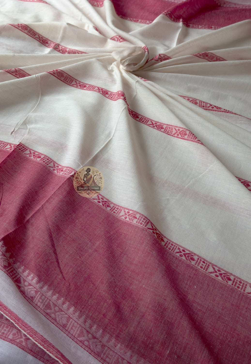 Styling detail of silk blouse paired with West Bengal handloom cotton saree for wedding function