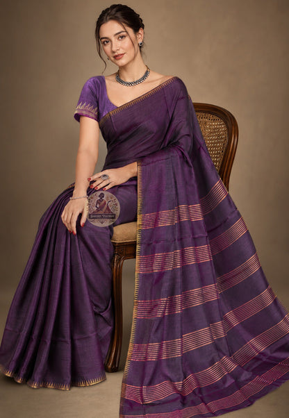 Front view of woman wearing Bishnupur Katan Silk Saree with gold jewellery, Diwali festive occasion
