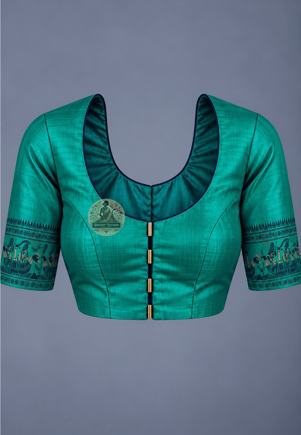 Blouse paired with green Baluchari silk saree, featuring patterned sleeve borders