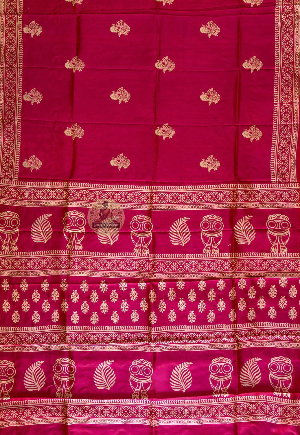 Detailed close-up of hand-stamped block print border on Bishnupur Silk Saree showing the natural variation and depth of carved wooden block patterns pressed by hand onto pure Bishnupur silk